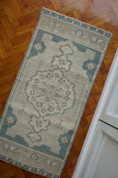 Handwoven Turkish Yastik rug with geometric patterns and rich colors