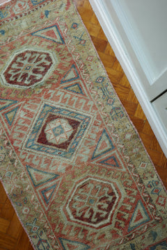 Handwoven Turkish Yastik rug with geometric patterns and rich colors