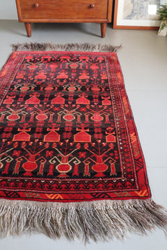 Afghan Pictorial Rug with Tribal Vase Motifs — No. 135 - Patina House